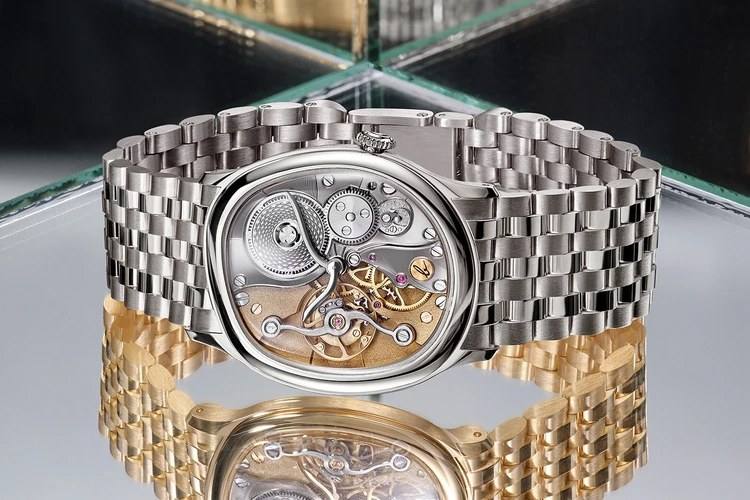 White-gold Berneron Mirage Miroir reflected in a mirror.