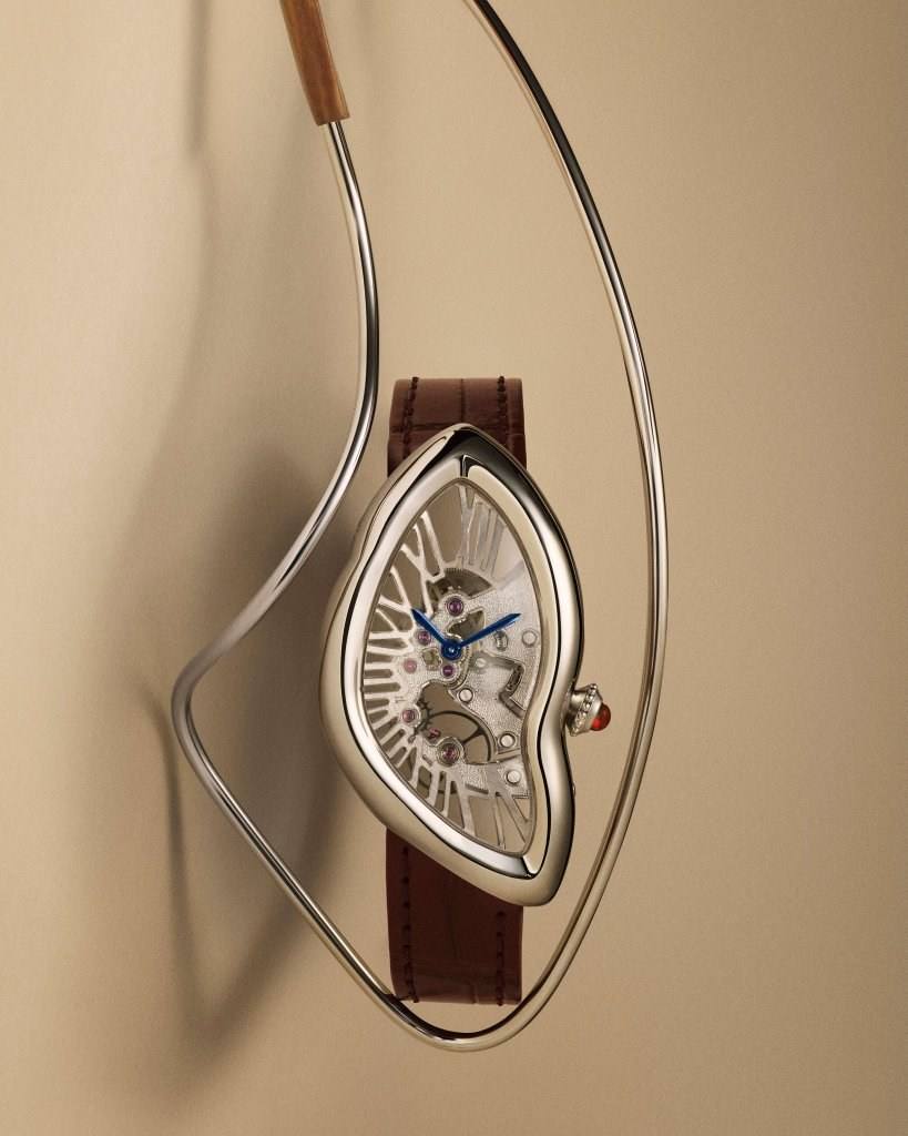 Cartier Prive Crash Squelette in platinum with burgundy details.