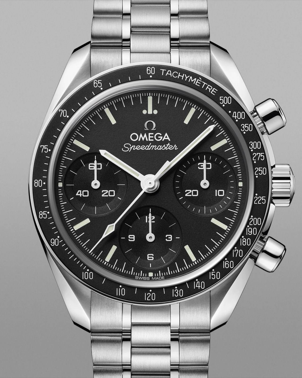 Omega Speedmaster 38 reference 324.30.38.50.01.002: black dial, black aluminium tachymeter bezel, steel five-link bracelet, no date