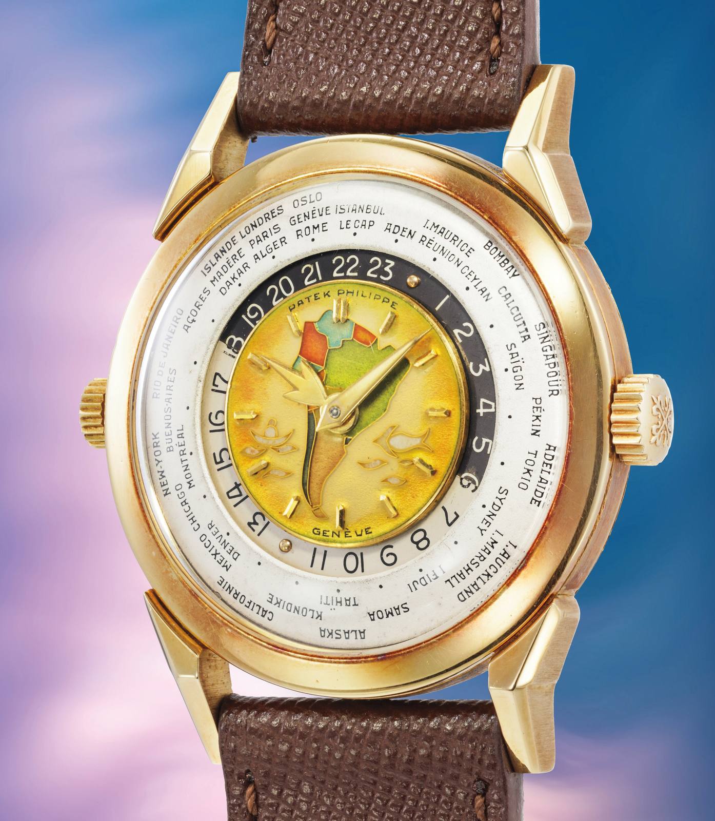 The Patek Philippe reference 2523 with the cloisonne enamel South America dial in yellow gold.