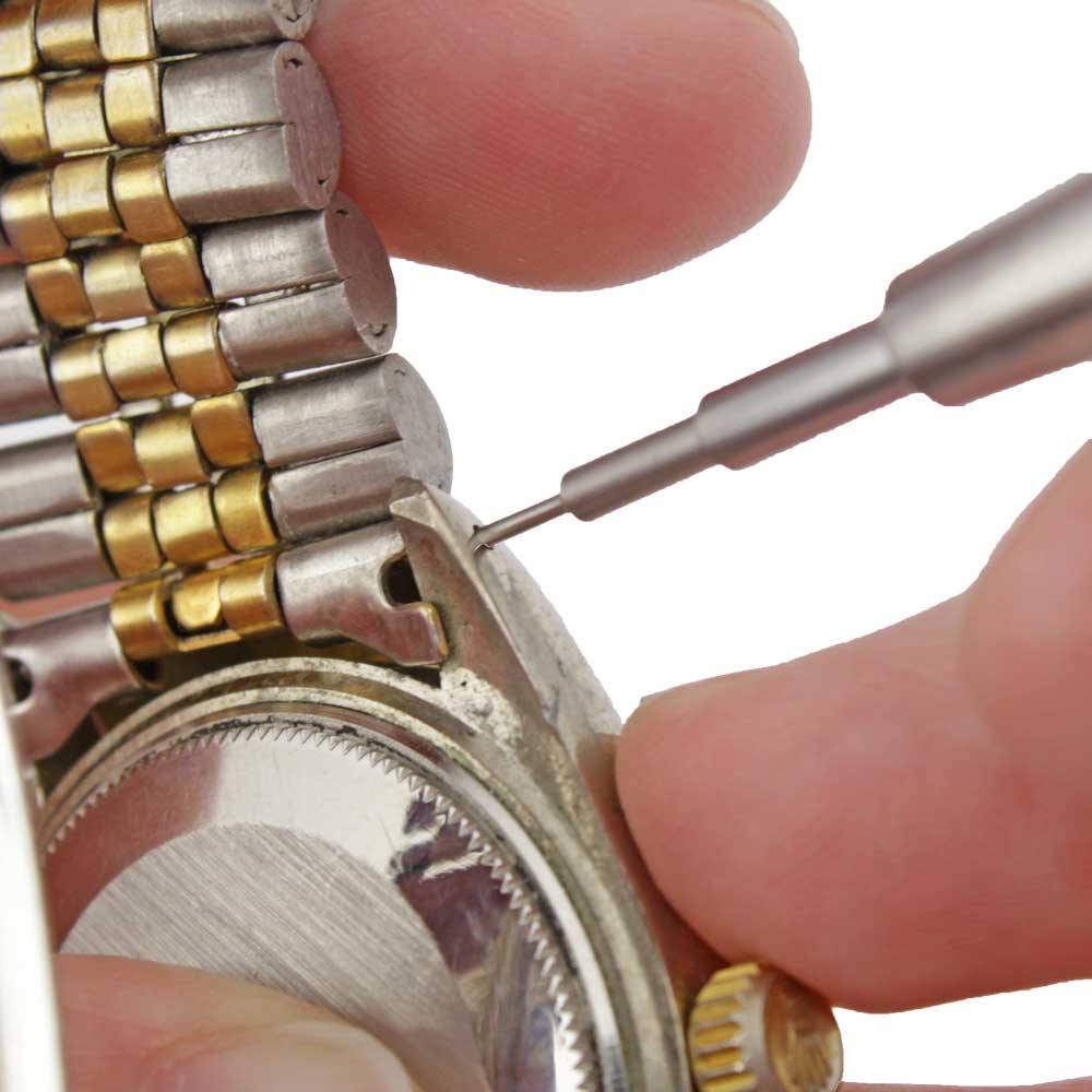 Bergeon 6767-F spring bar tool pressing a spring bar into a watch bracelet lug.