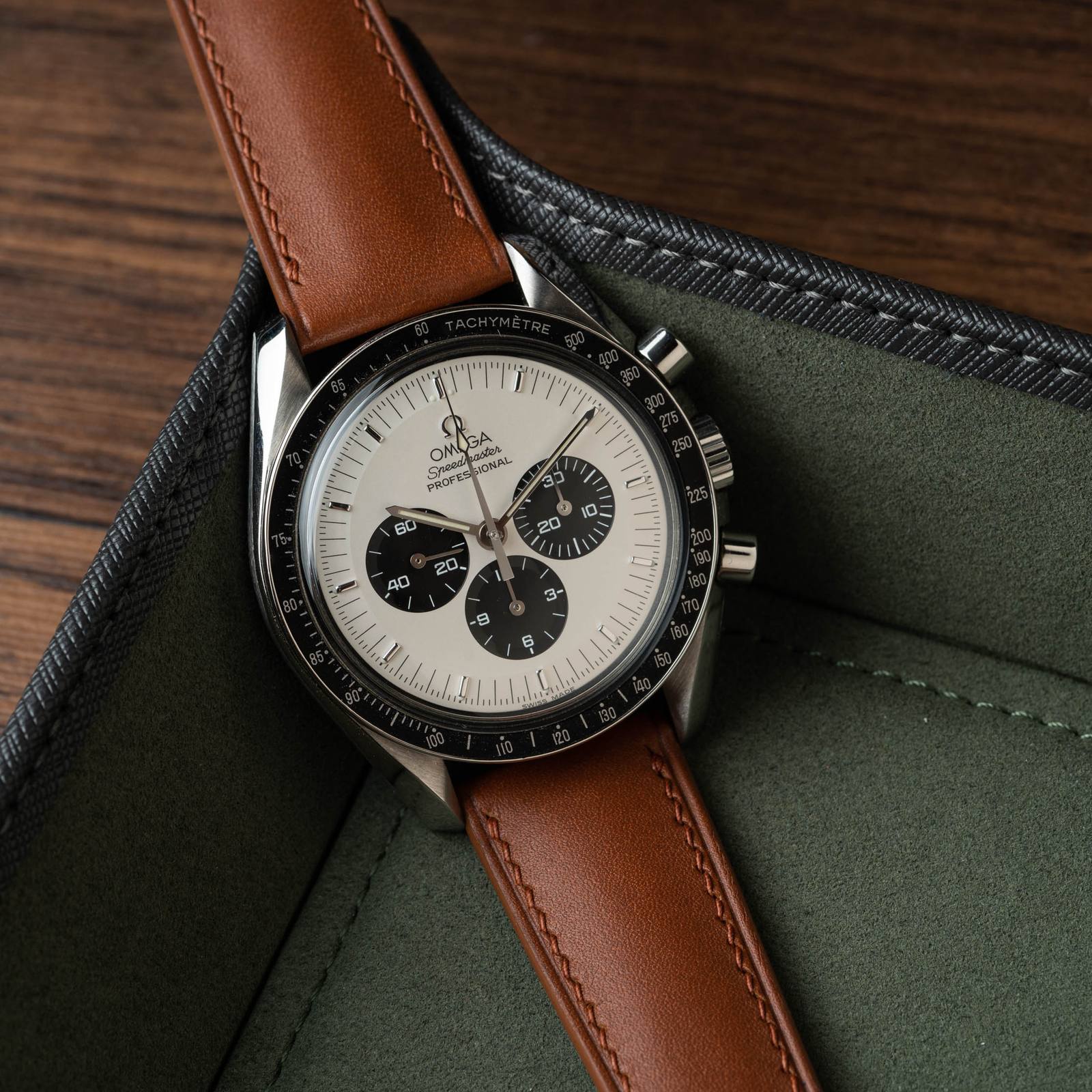 Fauve Baranil leather strap fitted to an Omega Speedmaster Professional with a panda dial