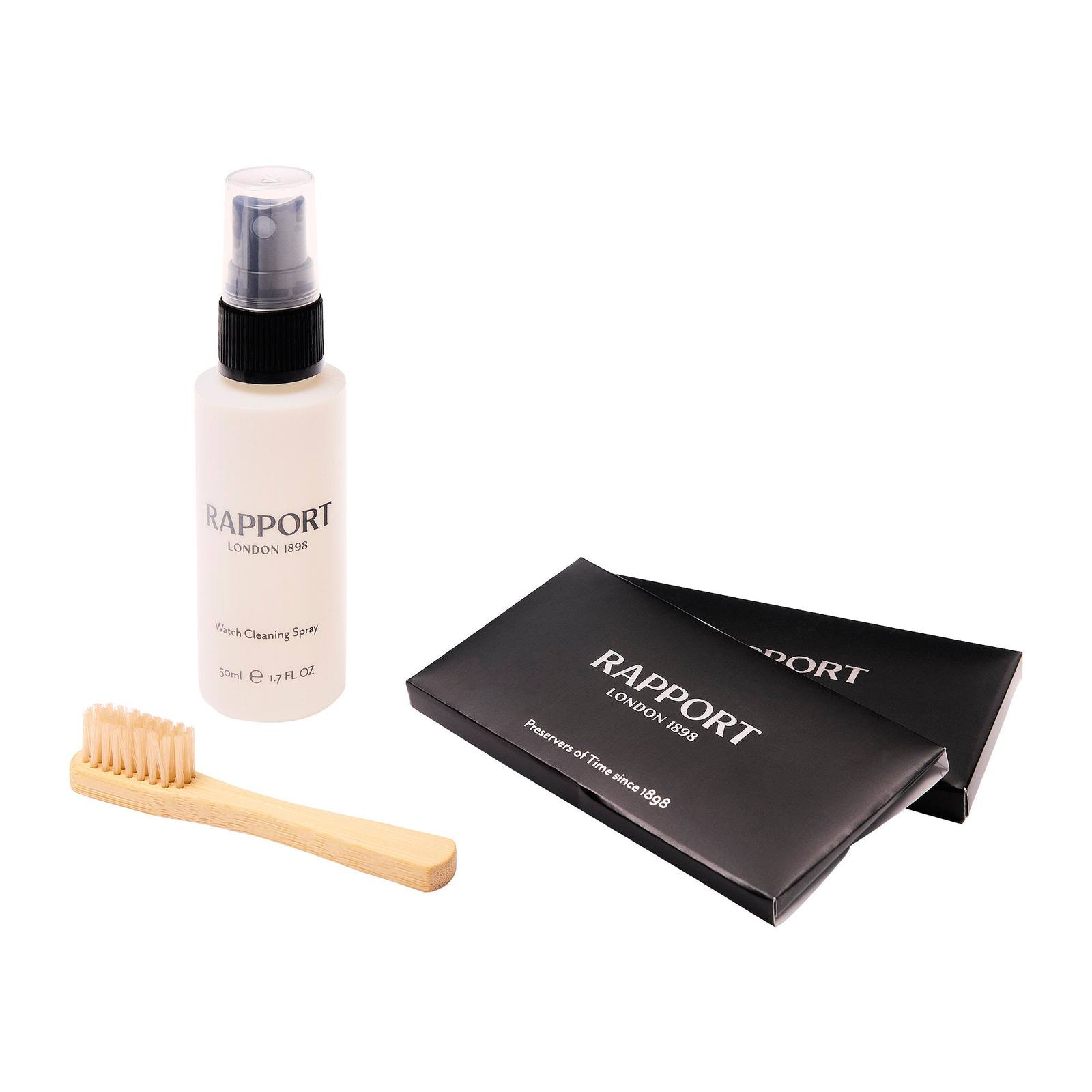 Rapport Luxury Watch Cleaning Kit contents laid out: spray, brush, and cloths.