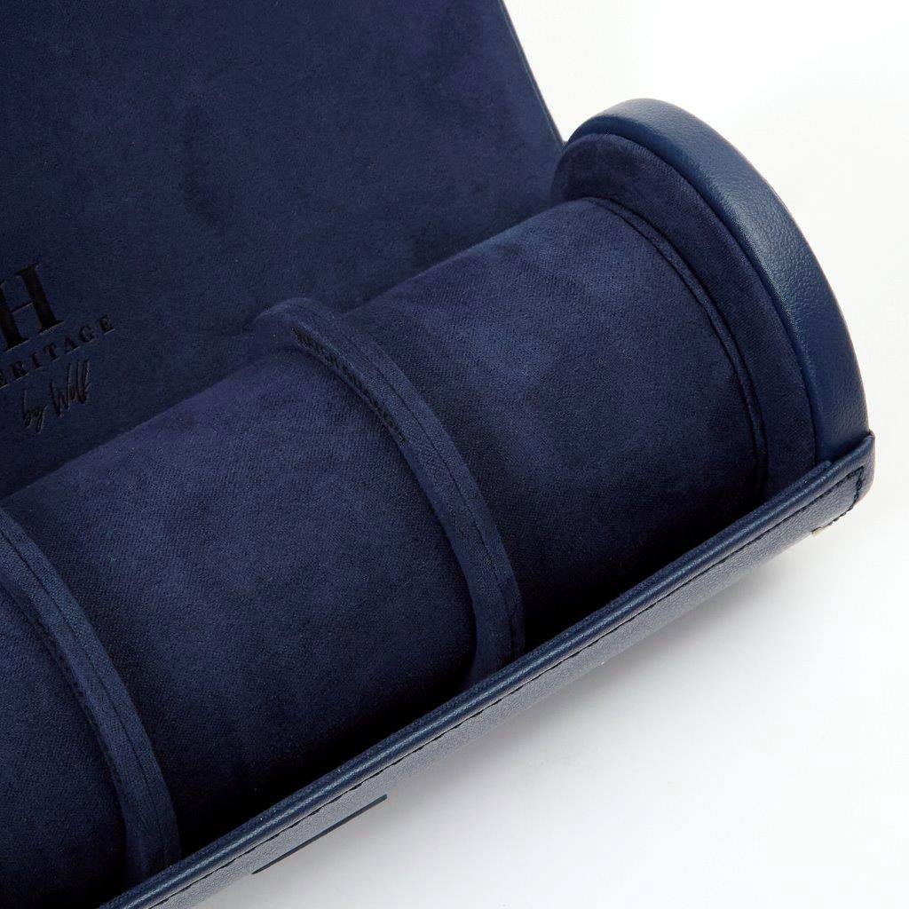 Open navy WOLF Heritage watch roll close-up showing the suede inner drum.