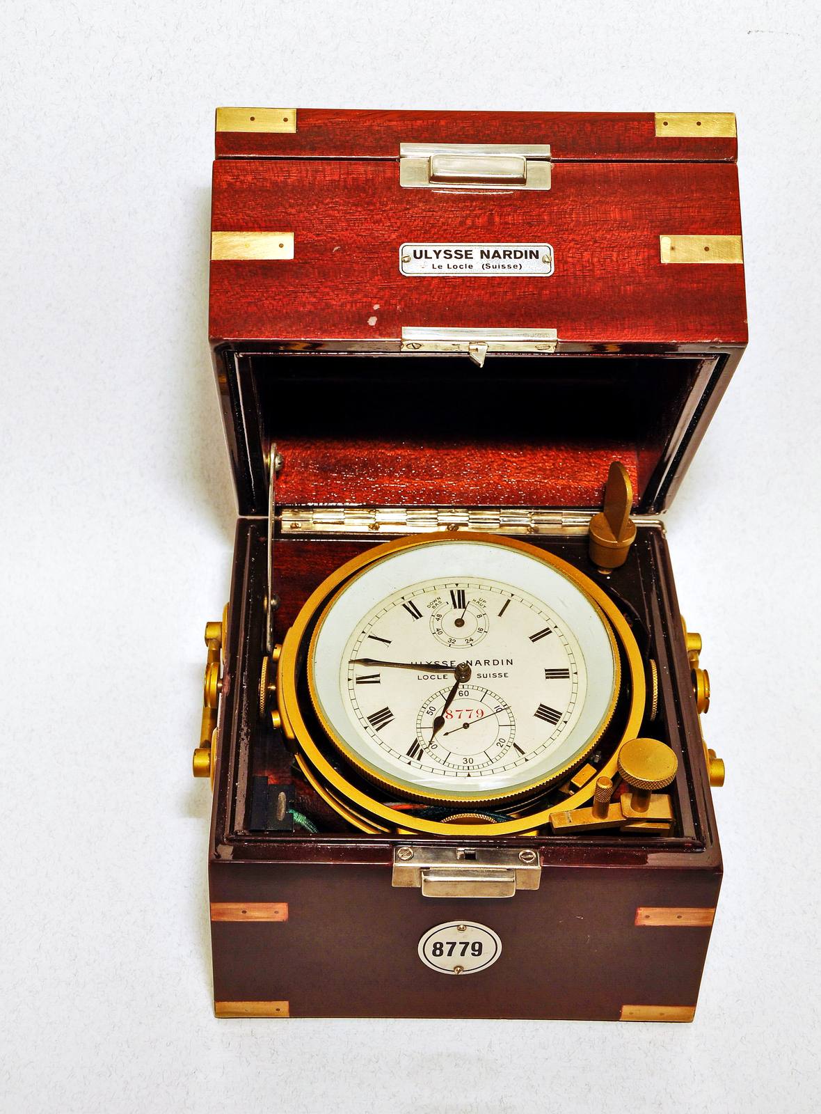 Ulysse Nardin marine chronometer in a wooden box.